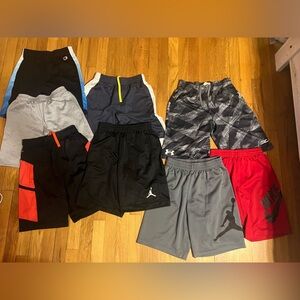 A lot of eight pairs of boys medium shorts size 10 to 12